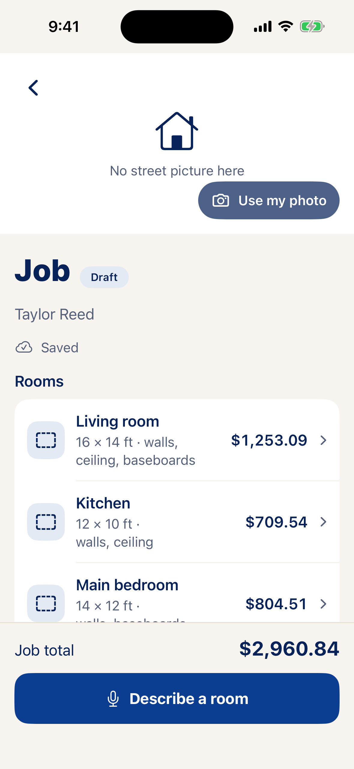 iPhone prototype showing synthetic room prices and a job total, with a visible “Describe a room” voice button.